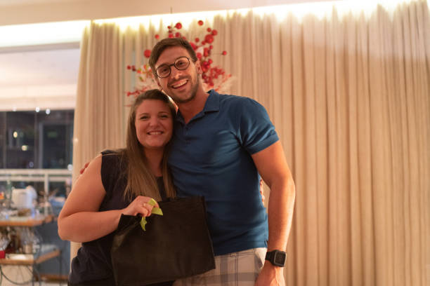 istock Friends Exchanging Christmas Presents Portrait 1083631886