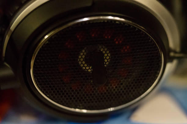 istock Black headphones isolated from the background lying on the table, large background blur. 1083632098