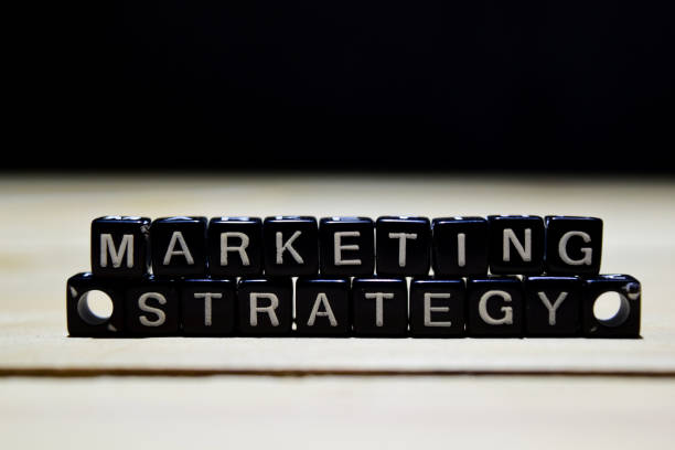 istock Marketing Strategy concept wooden blocks on the table. 1083635372