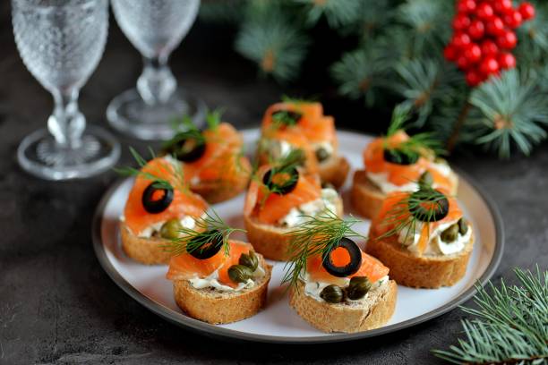 istock Canapes with cream cheese, salted salmon, capers 1083635472