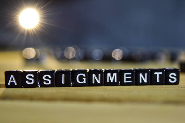 istock ASSIGNMENTS concept wooden blocks on the table 1083635548