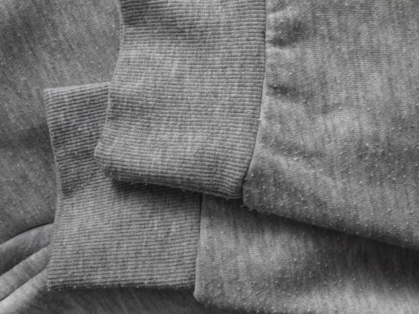 Pills on the heather gray sweatshirt cotton knit fabric