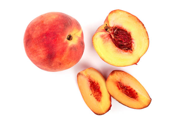 istock ripe peaches isolated on white background. Top view. Flat lay pattern 1083638104