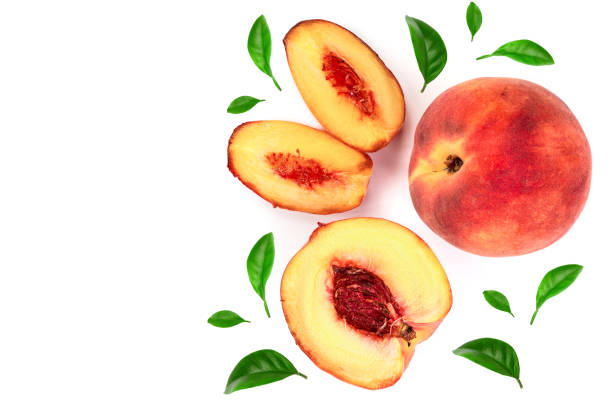 istock ripe peaches with leaves isolated on white background with copy space for your text. Top view. Flat lay pattern 1083638110