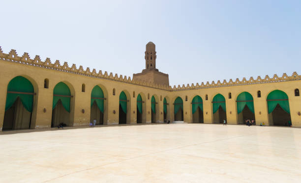 Inside al hakim mosque in Cairo Egypt . The Mosque of al-Hakim, nicknamed al-Anwar, is a major Islamic religious site in Cairo, Egypt. It is named after Al-Hakim bi-Amr Allah, the sixth Fatimid caliph and 16th Ismaili Imam. interior mezquita de al hakim en el cairo egipto. la mezquita al-hakim, apodado al-anwar, es un importante sitio religioso islámico en el cairo, egipto. se nombra después de al-hakim bi-amr allah, el sexto califa fatimí y 16 ismaili imam.
