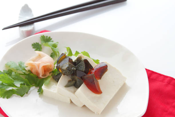 istock tofu and preserved egg on white background 1083655518