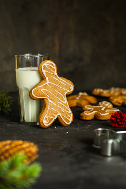 istock gingerbread man - handmade baking (dessert cookies). happy new year. food background 1083655912