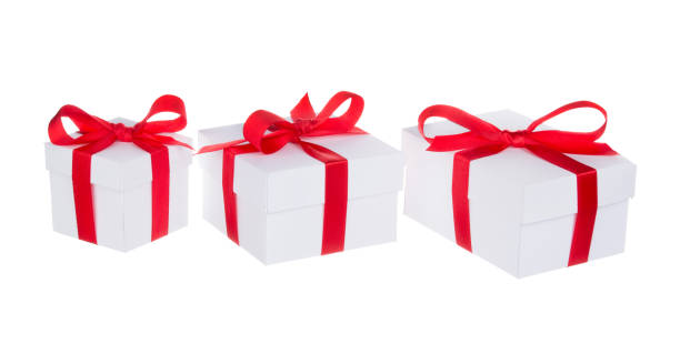 istock Stack of presents white gifts ribbon red bow isolated on white background 1083666664