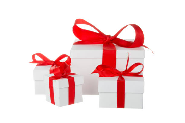 istock Stack of presents white gifts ribbon red bow isolated on white background 1083666680