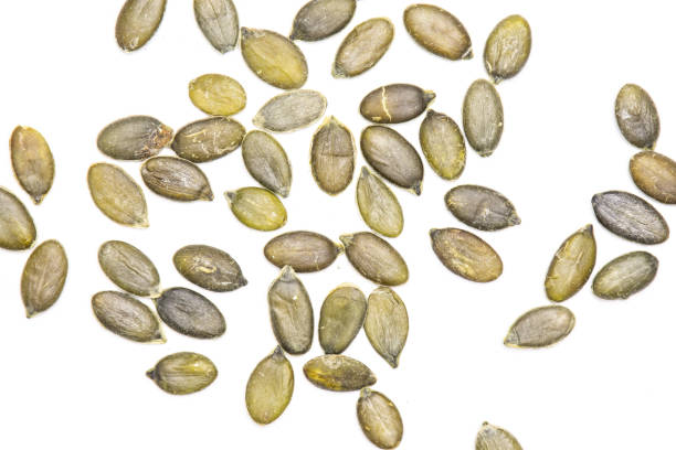 istock Hulled pumpkin seeds isolated on white 1083669994
