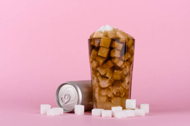 Unhealthily diet with sweet sugary soft drinks Unhealthily diet with sweet sugary soft drinks concept Sugar stock pictures, royalty-free photos & images