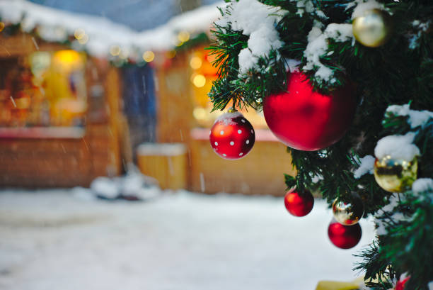 Close up view of the Christmas tree in an open air Christmas market.