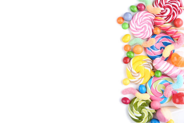 istock Sweet candies and lollipops on white background 1083675564
