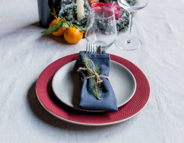 istock Holiday serving plate with fork and knife at white table 1083677342