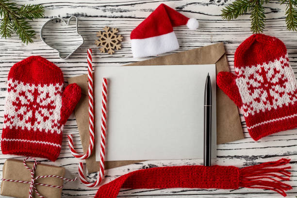 istock Christmas mail, envelopes with letters on wooden table 1083678526