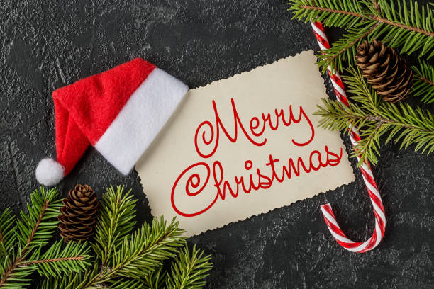 istock MERRY CHRISTMAS handwritten inscription. Winter holiday composit 1083680170