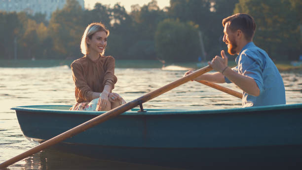 istock Attractive couple in a boat 1083680280