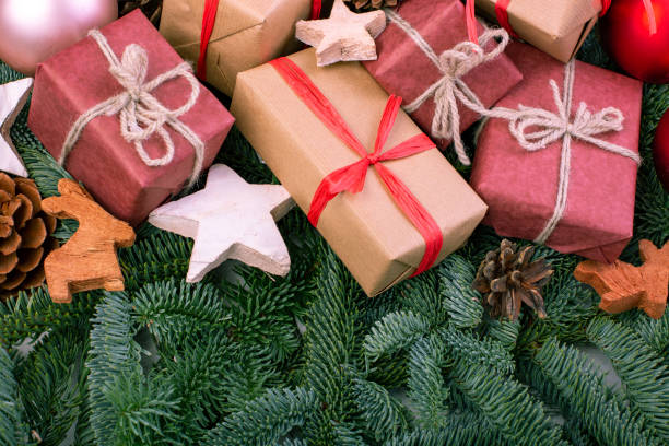 istock Christmas composition. Christmas decorations, fir tree branches with toys gift boxes. greeting card. Flat lay, top view, copy space 1083680640