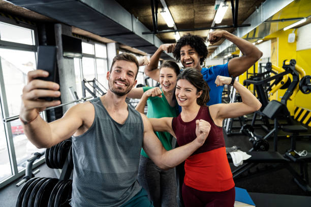 istock Athletic friends taking a selfie at the gym 1083683054