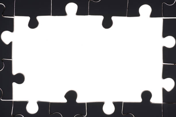 istock full frame of black and white puzzles backdrop 1083684172