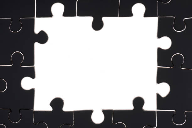istock full frame of black and white puzzles backdrop 1083684200