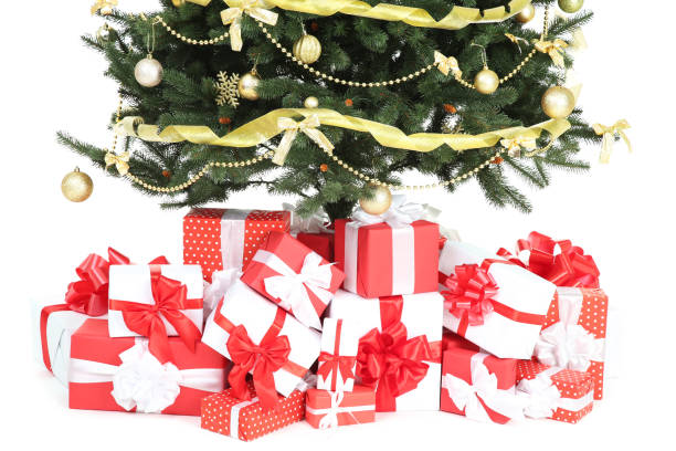 istock Christmas tree with decorations and gift boxes on white background 1083686950