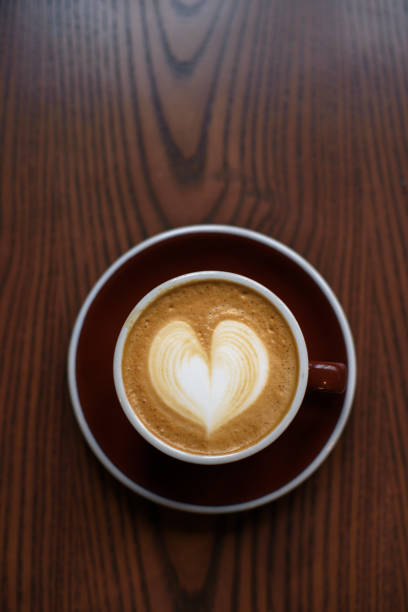 istock Coffee latte on wooden table 1083687304