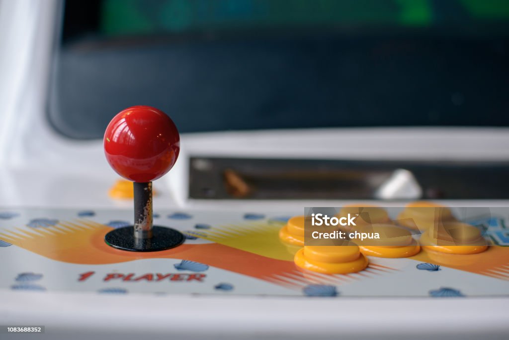 Arcade machine joystick and button Amusement Arcade Stock Photo