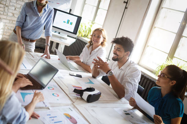 istock Successful business group of people at work in office 1083688798