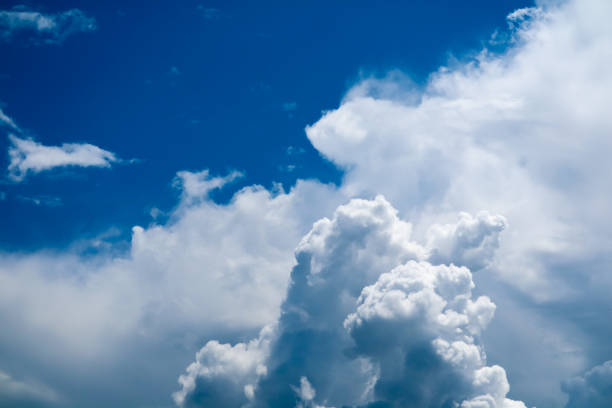 istock Beautiful heap clouds with clear blue sky and sunlight 1083689100