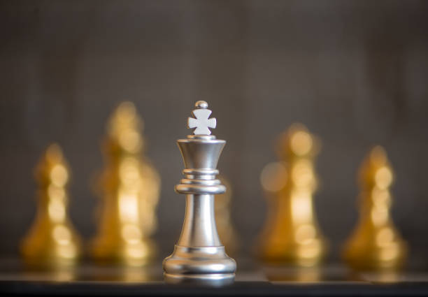 istock Chess pieces placed on top of a board 1083692986