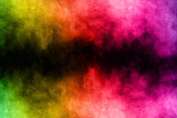 istock abstract colored dust explosion on a black background.abstract powder splatted background,Freeze motion of color powder exploding/throwing color powder, multicolored glitter texture. 1083699672