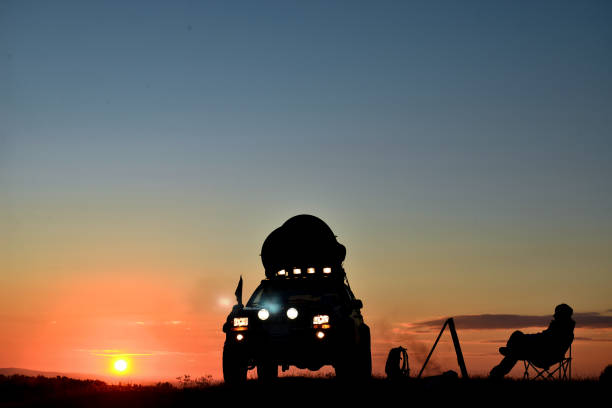 istock summit camping pleasure with land vehicle 1083702912