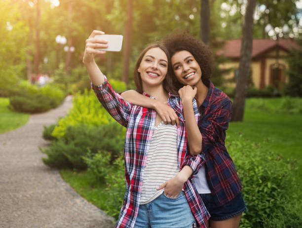 istock Female bloggers taking picture for publication on webpage 1083703836