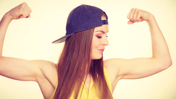 istock Woman casual style showing off muscles biceps 1083707870
