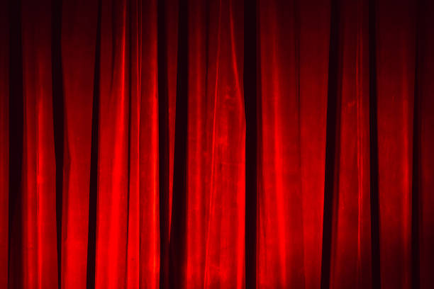 istock Red vintage velvet curtain, background texture 1083711090