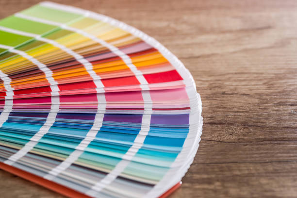 istock Colour swatch on wooden table as background 1083716662