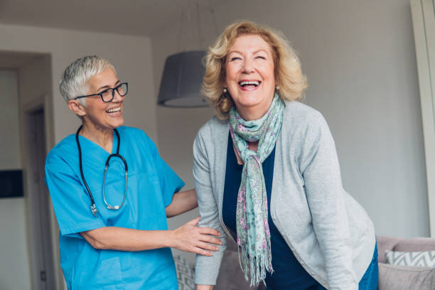 istock Happy woman with caregiver 1083717492