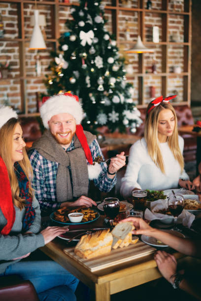 istock Friends having dinner at home at Christmas eve. 1083719422