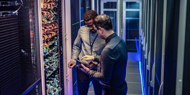 istock IT engineers using a digital tablet in the server room of a data center 1083723180