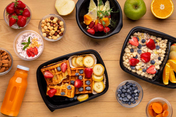 Order organic ready breakfast concept, top view Organic breakfast meal delivery in plastic containers, top view ready to eat photos stock pictures, royalty-free photos & images