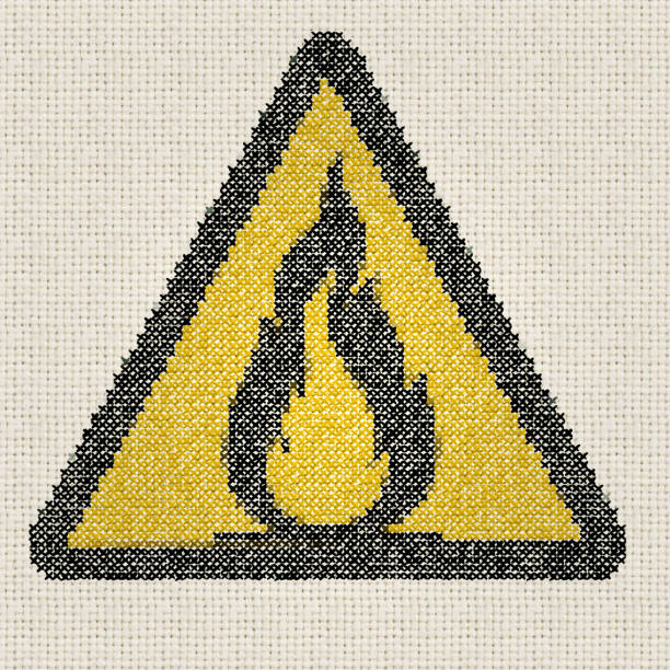 embroidered fire hazard sign  Embroidery by contributor