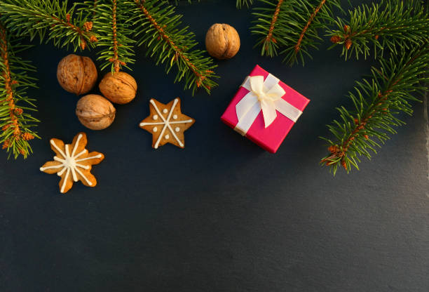 istock Christmas background with present, cookies and spruce branches. 1083723856