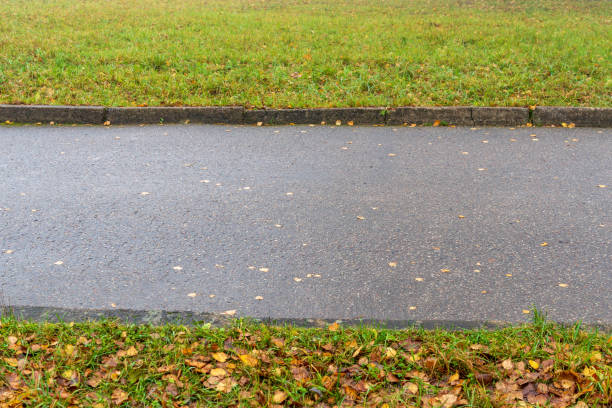 istock summer asphalt road in perspective 1083727208