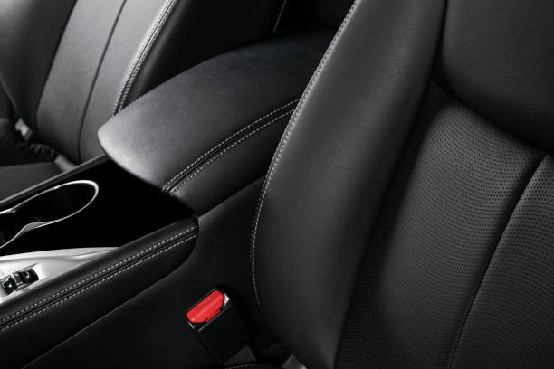 istock Car inside. Interior of a car. Comfortable leather seats. Perforated leather. Car interior details. Car detailing 1083727396
