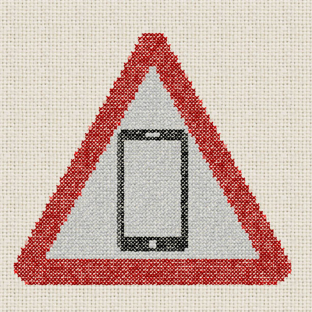 red triangle embroidered smart phone sign  Embroidery and stitch pattern by contributor