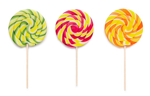 Colorful spiral round lollipops isolated on white background