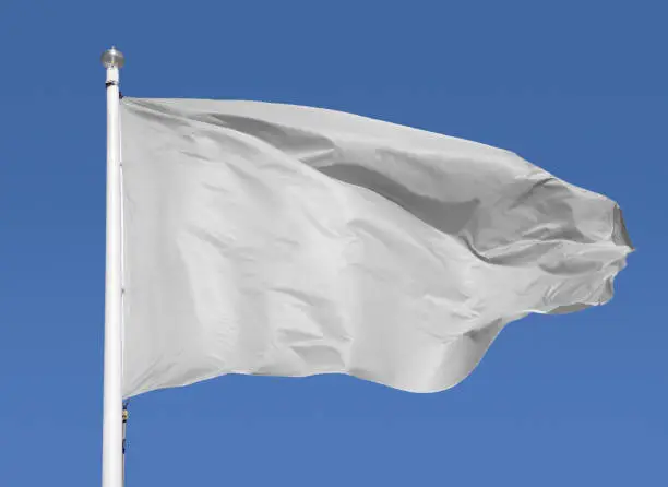 Photo of White flag waving