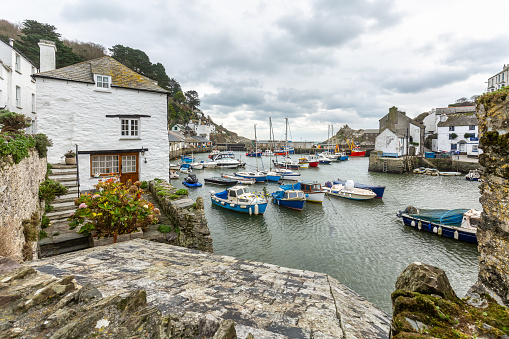 View between cottages, at the historic and quaint fishing harbour of Polperro, in the beautiful county Cornwall.