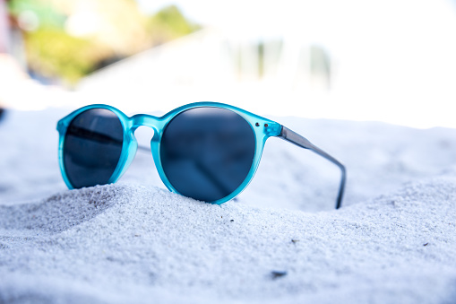 Sunglasses in the beach sand